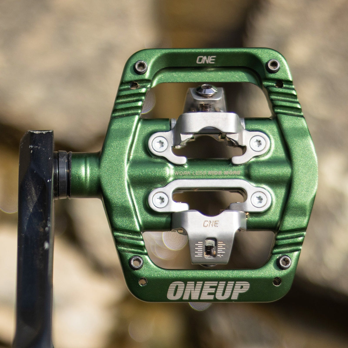 Dark green OneUp Clip pedal installed on a crank