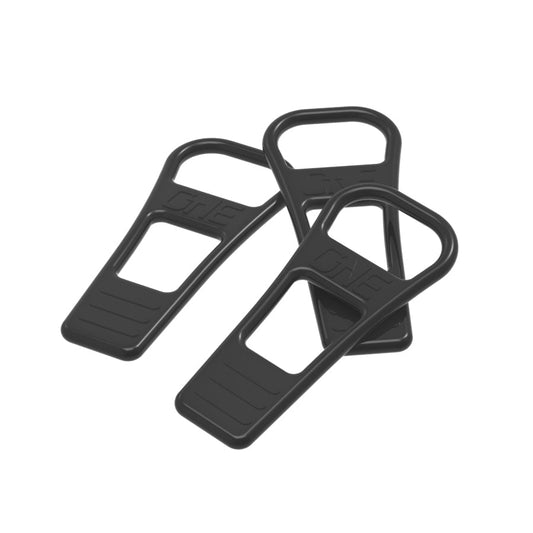 Three black OneUp EDC pump retaining straps
