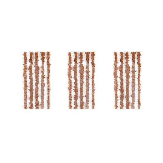 OneUp EDC tyre-repair strips arranged in three groups