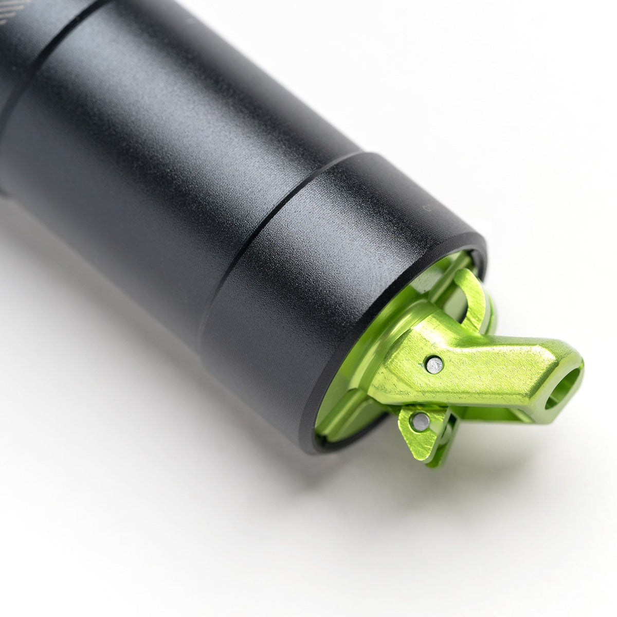Green cable actuator at the base of a OneUp V3 dropper post