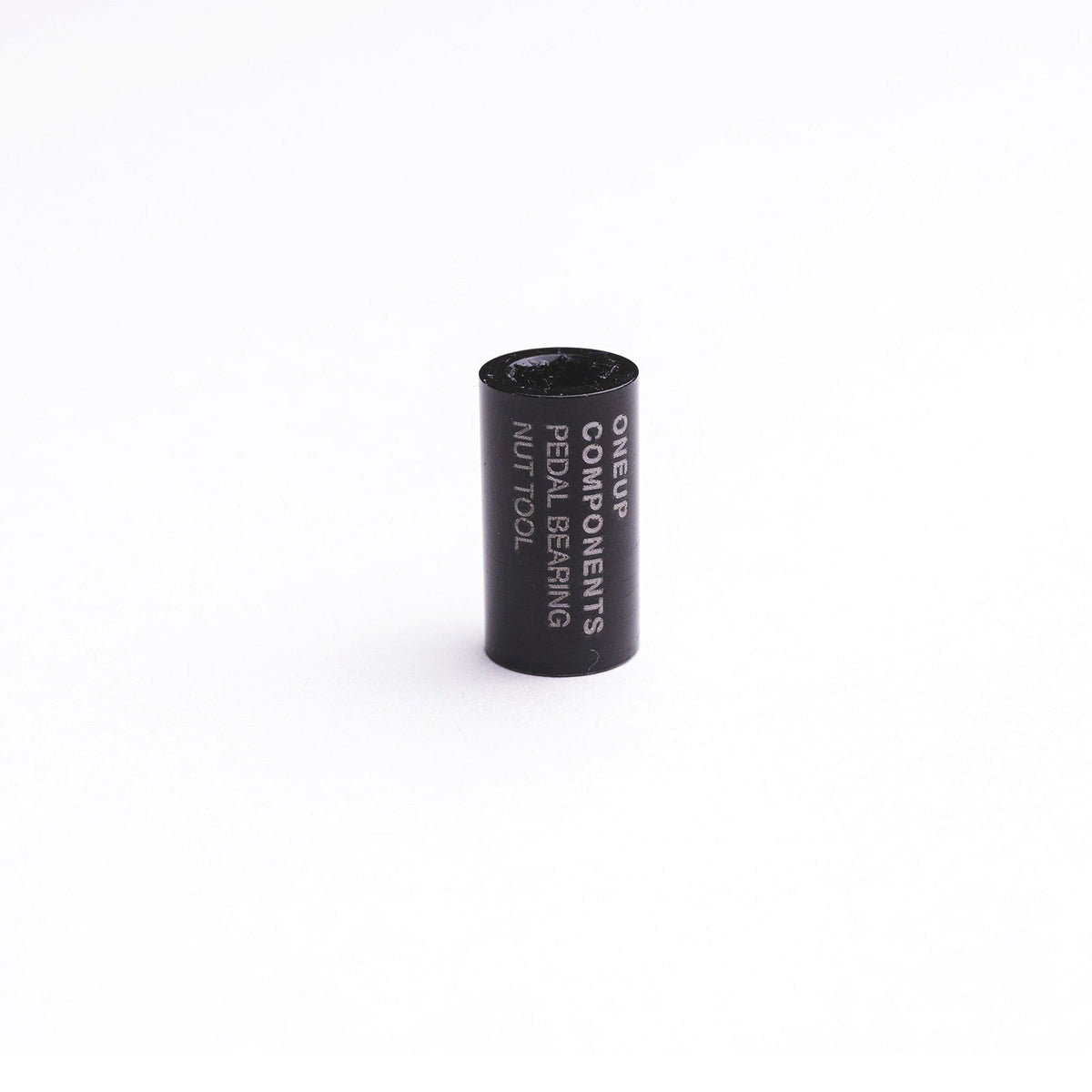 Black OneUp pedal bearing-nut tool