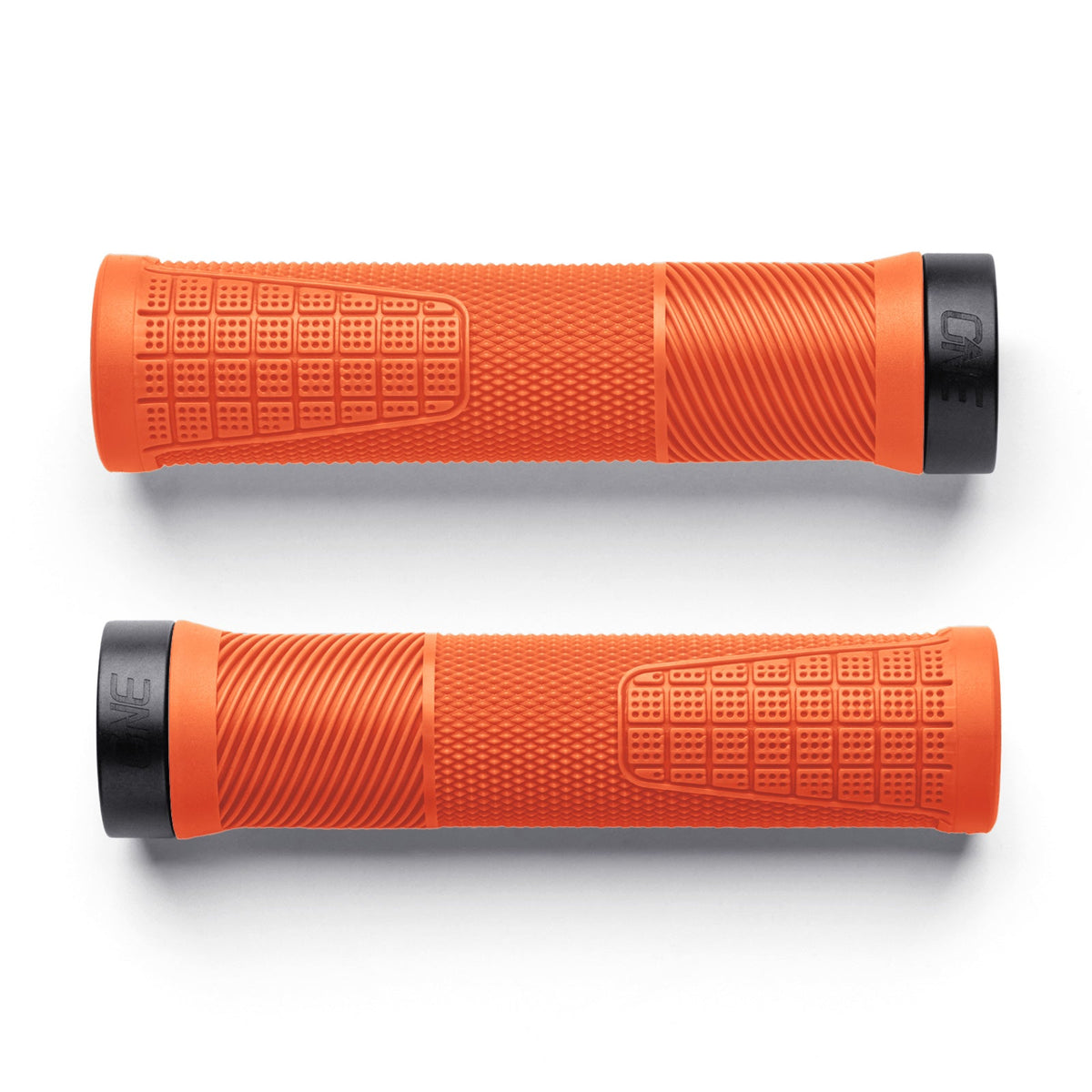 Pair of orange OneUp Thin Grips, top view