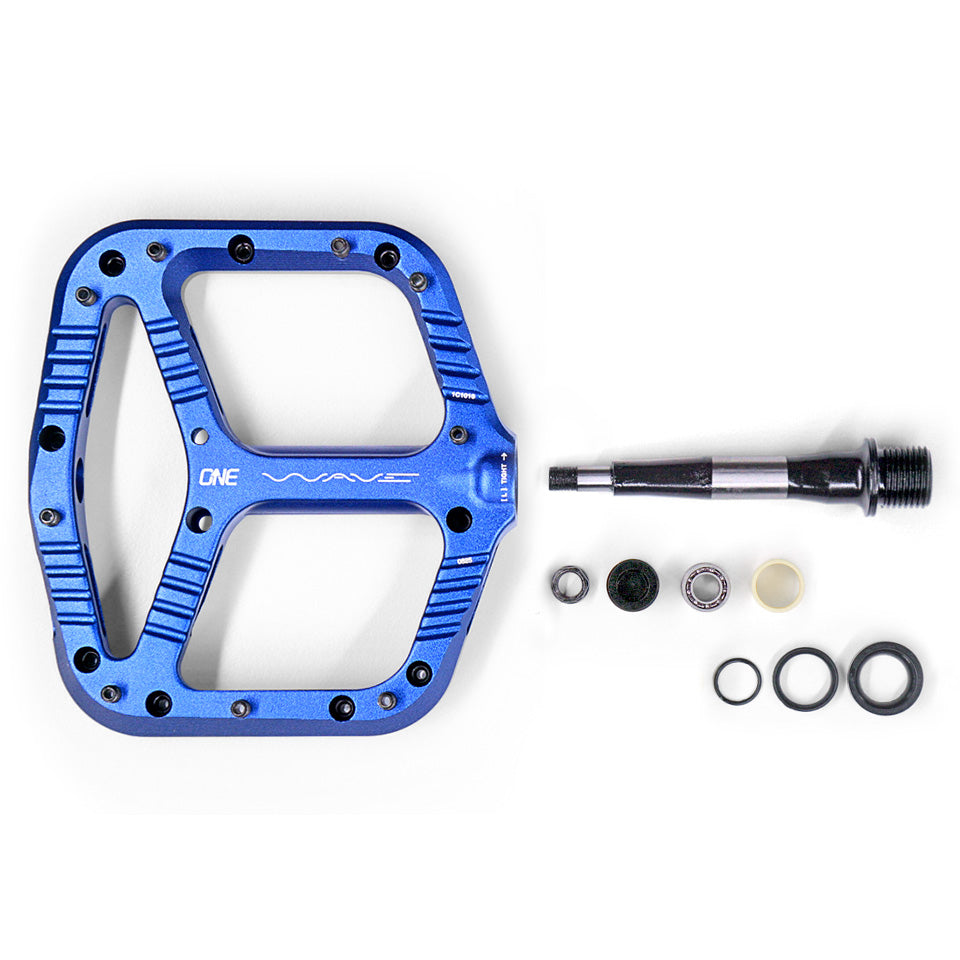 OneUp Wave pedal with axle, bearings, bushings and seals removed