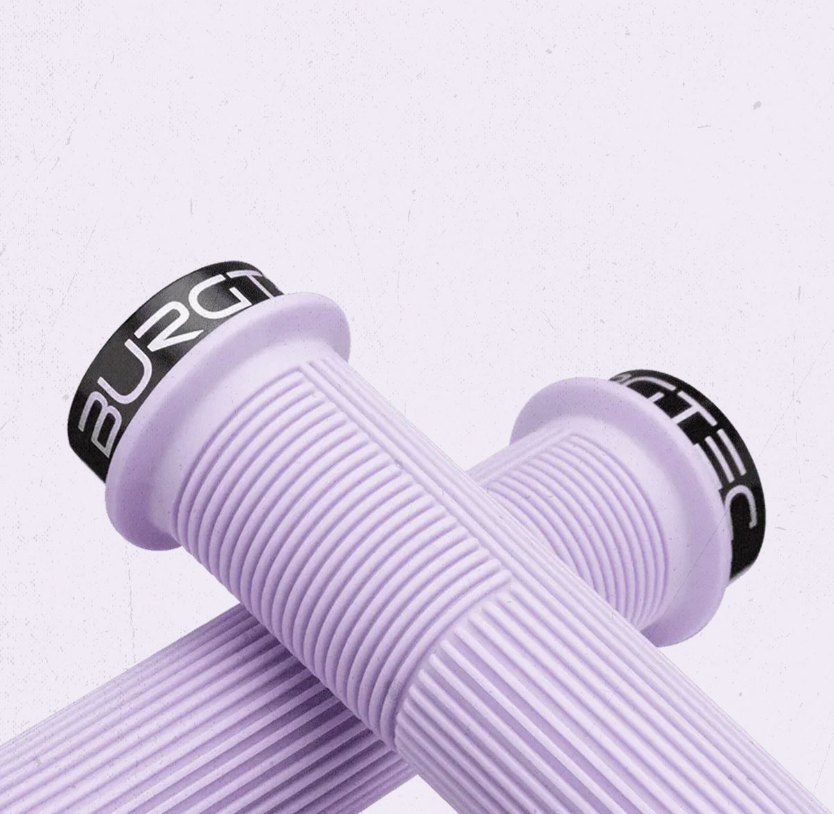 Close-up of the ribs and inner flange on a violet Burgtec Josh Bryceland grip