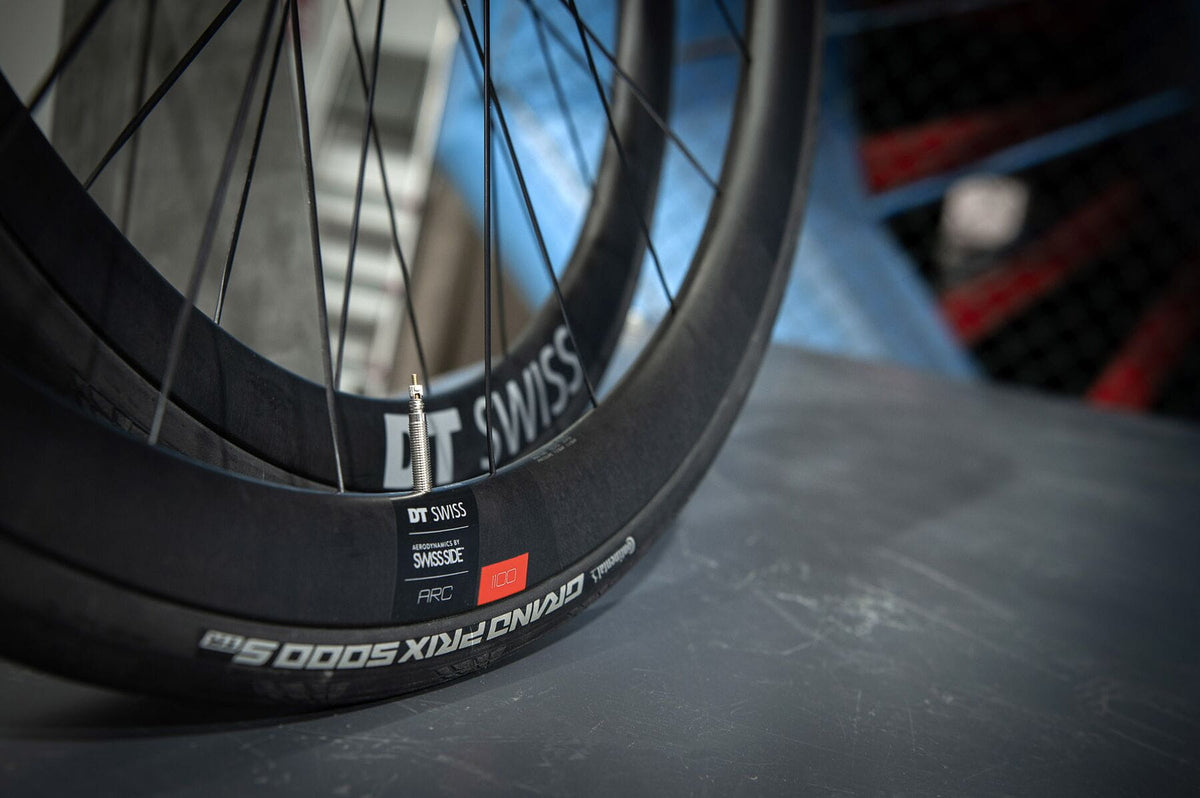 DT Swiss ARC 1100 DICUT 38 x 20 mm Clincher Ratchet EXP Rear Wheel - riding and product context