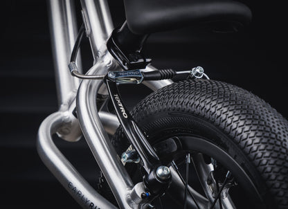 Early Rider Belter 12 Balance Bike in Brushed Aluminium - Vee Speedster rear tyre tread with rim brake visible
