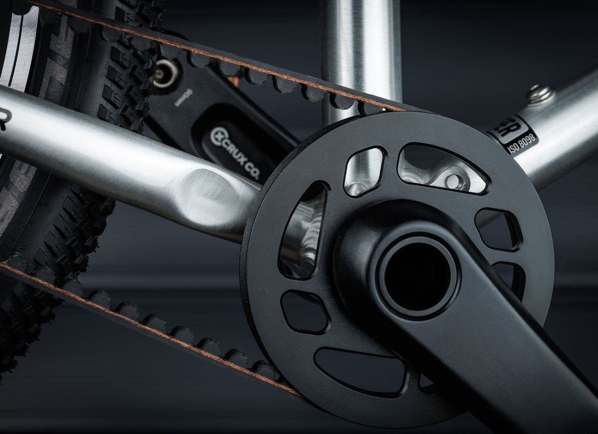 Early Rider Belter 16 in Brushed Aluminium - belt, front sprocket and crank close-up