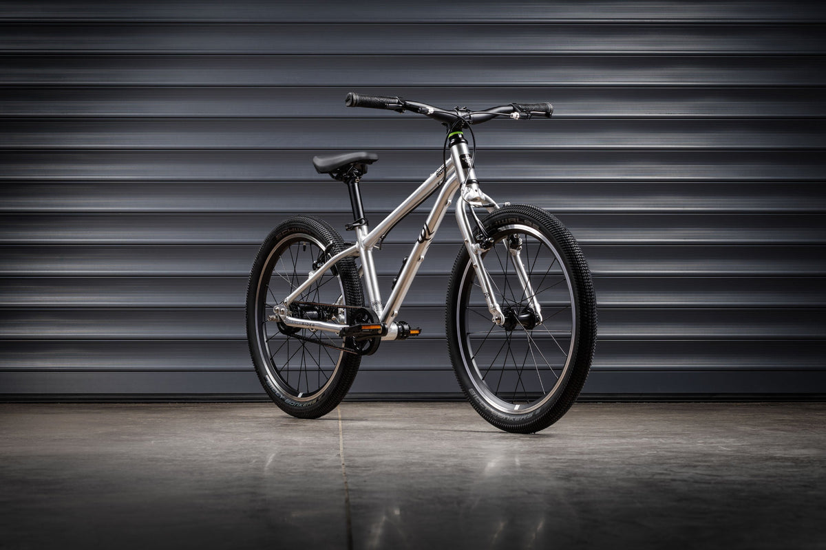 Early Rider Belter 20 Auto in Brushed Aluminium against grey shutters