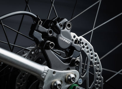 Early Rider Belter 24 in Brushed Aluminium - rear Tektro disc brake caliper and rotor