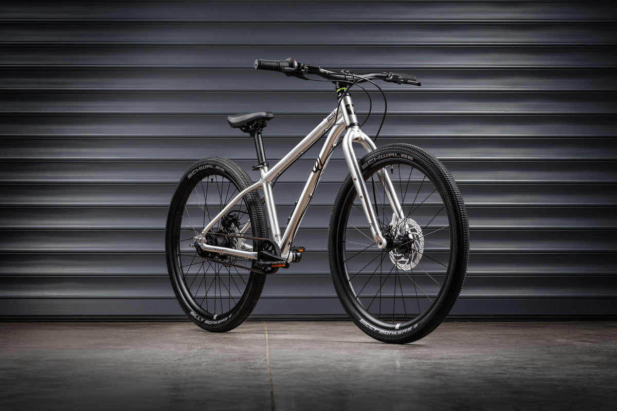 Early Rider Belter 24 in Brushed Aluminium against grey shutters