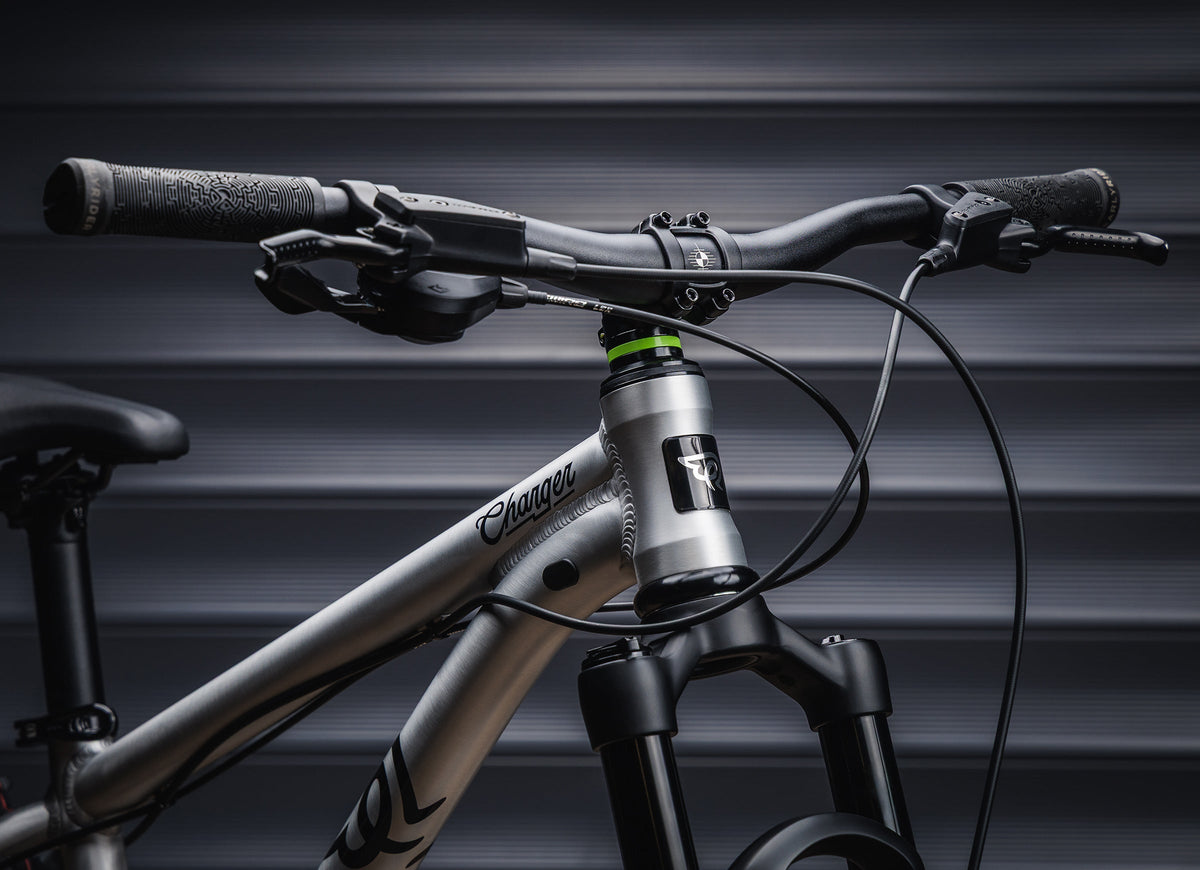 Early Rider Charger 20 in Brushed Aluminium - handlebar controls and suspension fork crown