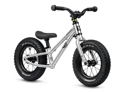 Early Rider Seeker 12 Balance Bike in Brushed Aluminium - brushed balance bike on white with knobbly tyres and no fitted brake