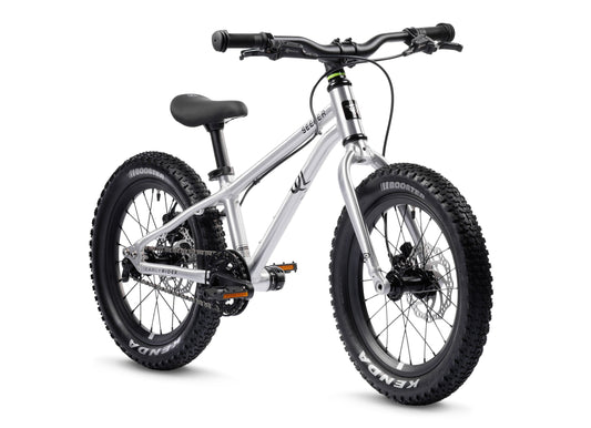 Early Rider Seeker 16 in Brushed Aluminium - three-quarter whole bike on white