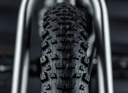 Early Rider Seeker 16 in Brushed Aluminium - Kenda Booster tread detail