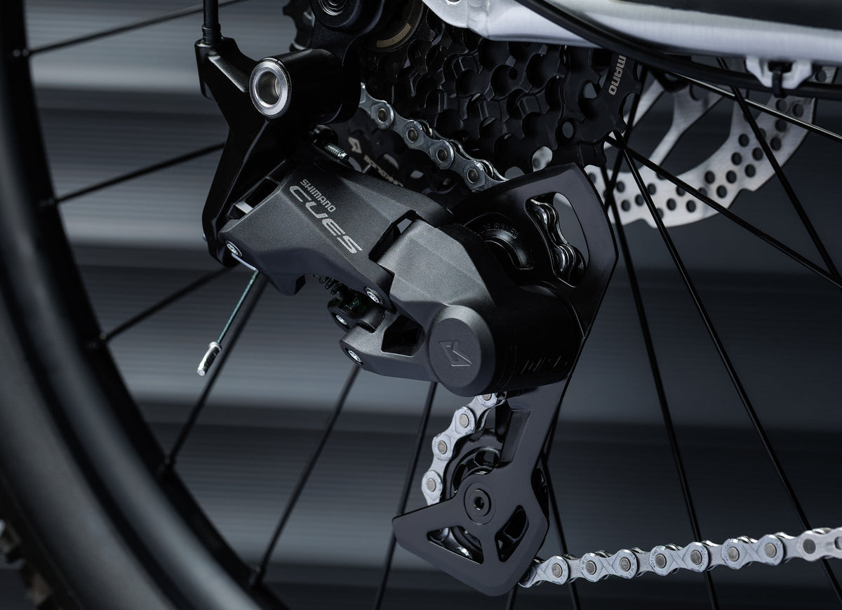 Early Rider Seeker 24 in Brushed Aluminium - Shimano CUES rear derailleur