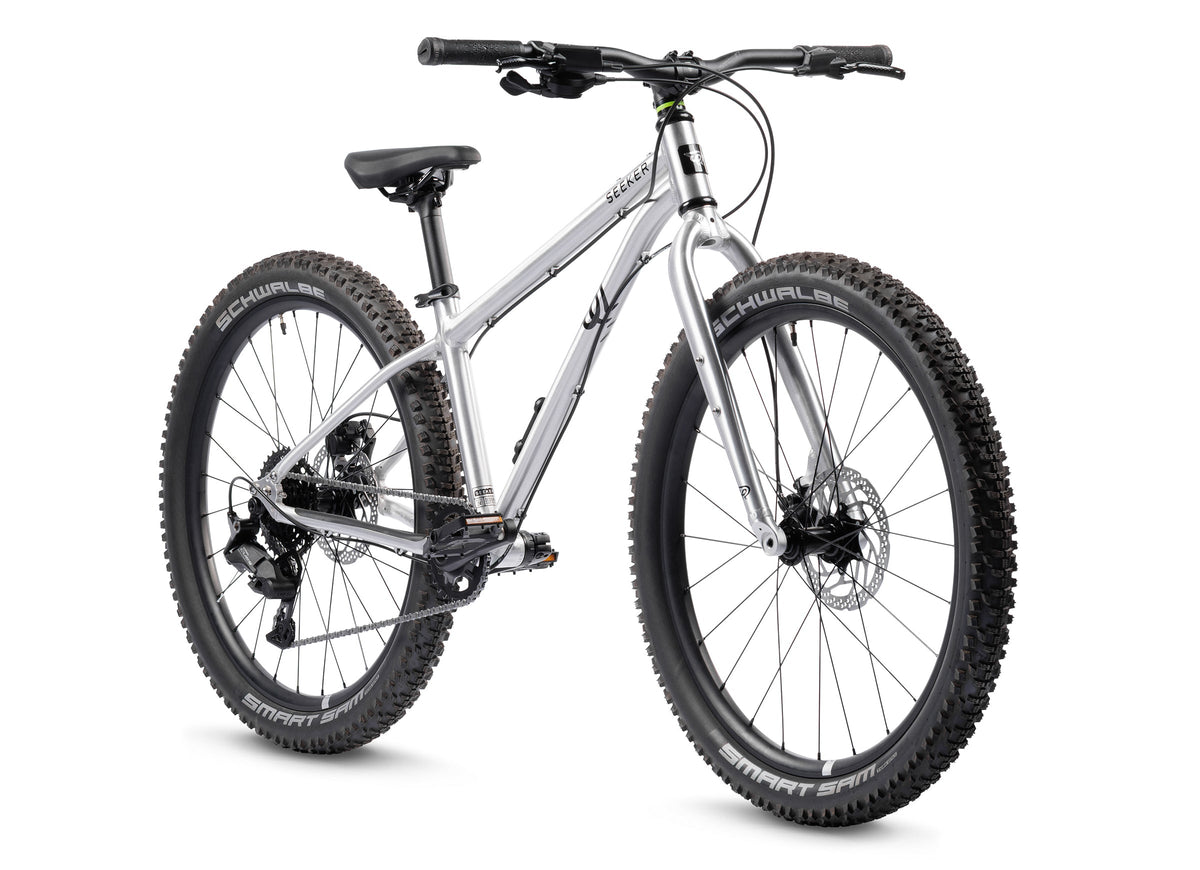 Early Rider Seeker 24 in Brushed Aluminium - three-quarter whole bike on white