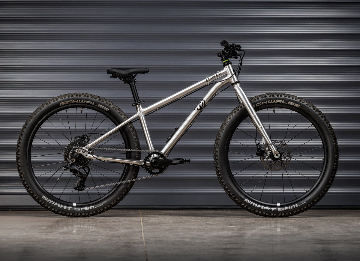Early Rider Seeker 24 in Brushed Aluminium - geared rigid bike drive-side profile