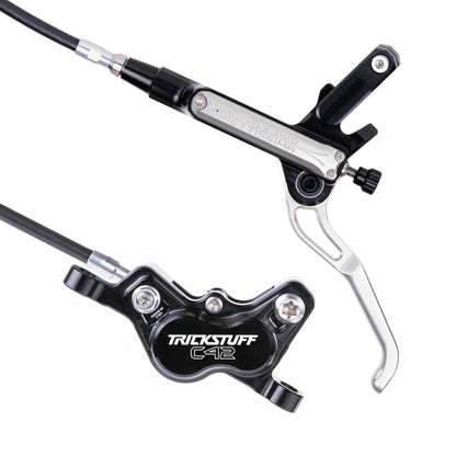 Trickstuff Direttissima brake lever and caliper in black with silver reservoir cap.