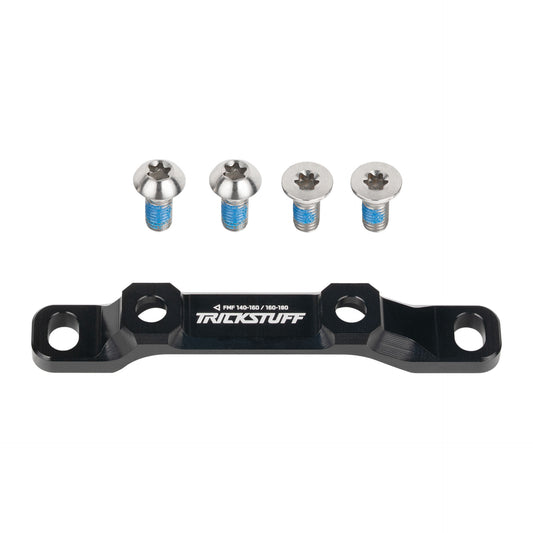 Black Trickstuff front flat-mount brake adaptor with four mounting bolts.