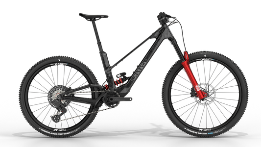 UNNO MITH Race RS in Forged Carbon with red RockShox suspension, drive-side view